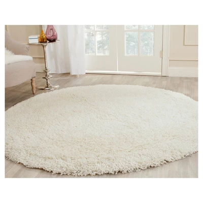 White Solid Shag And Flokati Tufted Round Accent Rug 4' - Safavieh 4 White Solid Shag And Flokati Tufted Round Accent Rug 4' - Safavieh - Image 2